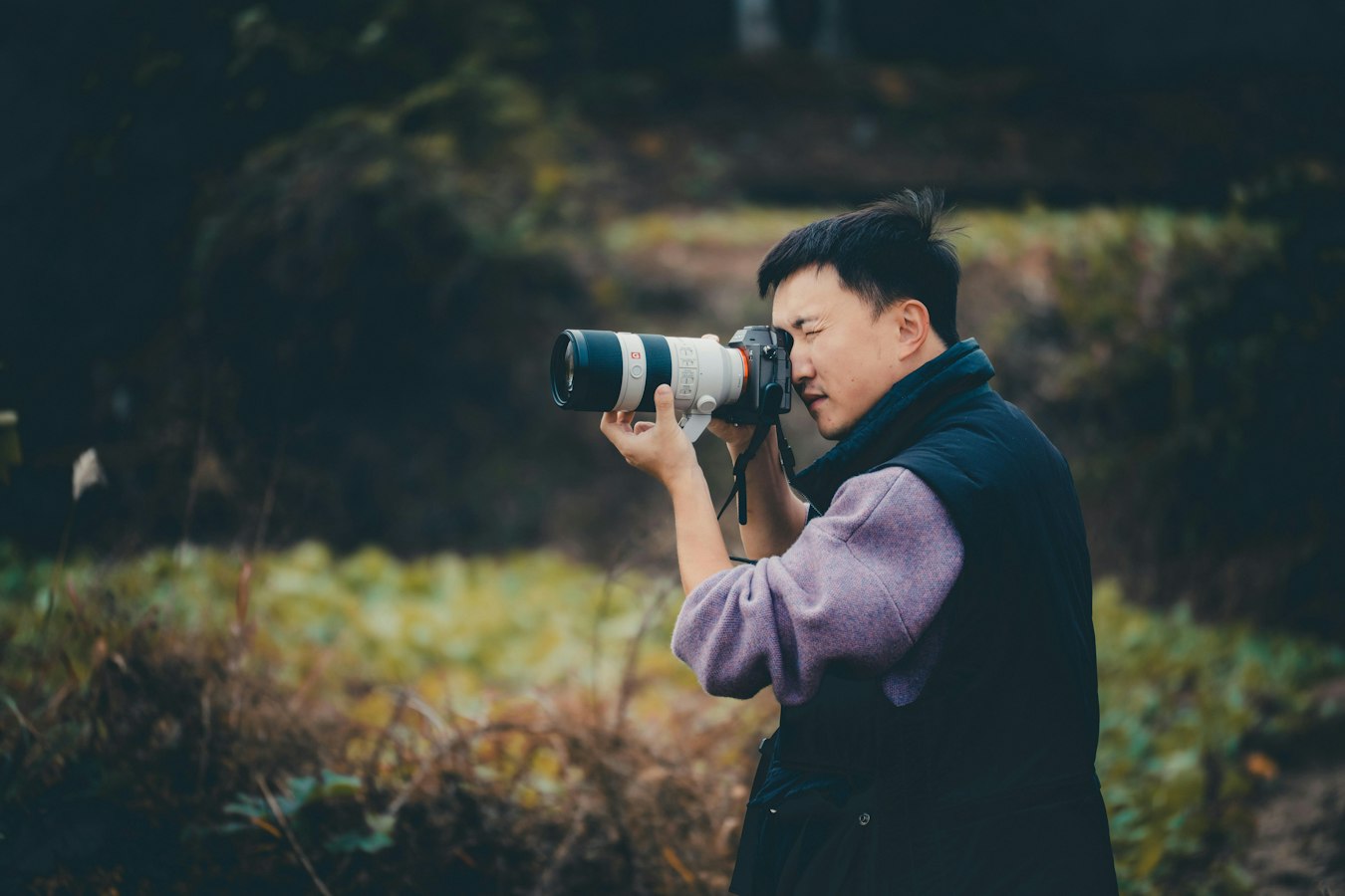 Photographer reviewing a model release form with a subject on location in Washington state