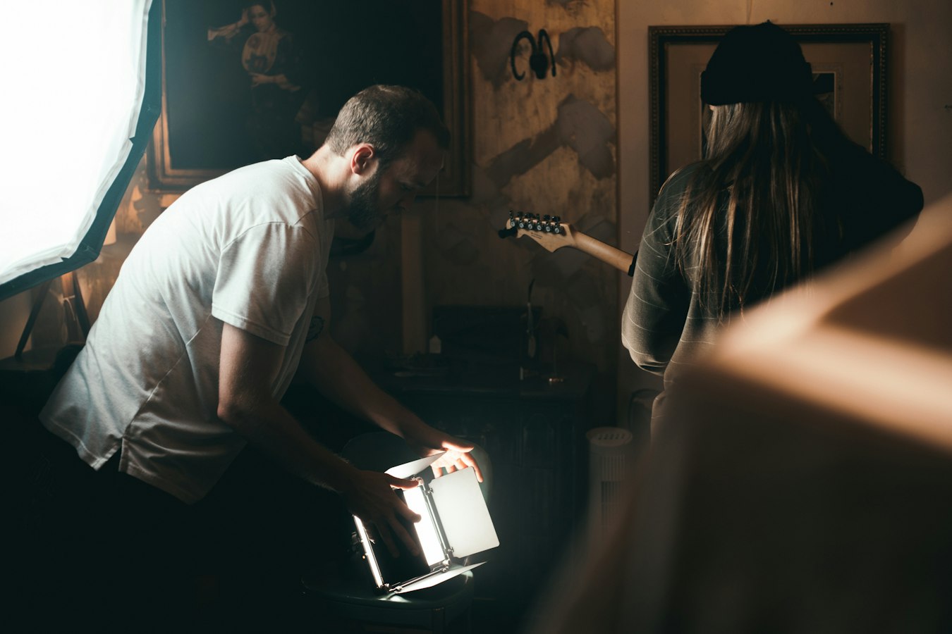 Photographer reviewing a model release form with a subject before a shoot in Pennsylvania