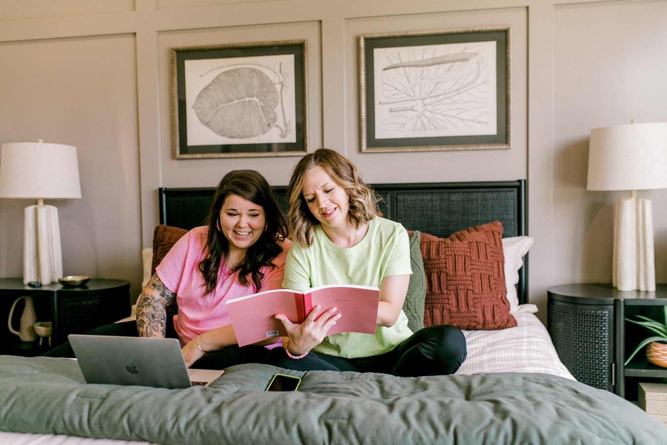 A short-term rental host reviewing a guest booking on a laptop