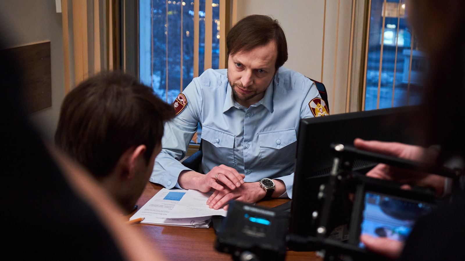 Photographer reviewing a model release form with a subject on a Georgia photo shoot