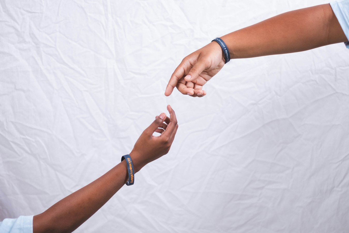 Two professionals sharing contact information face to face
