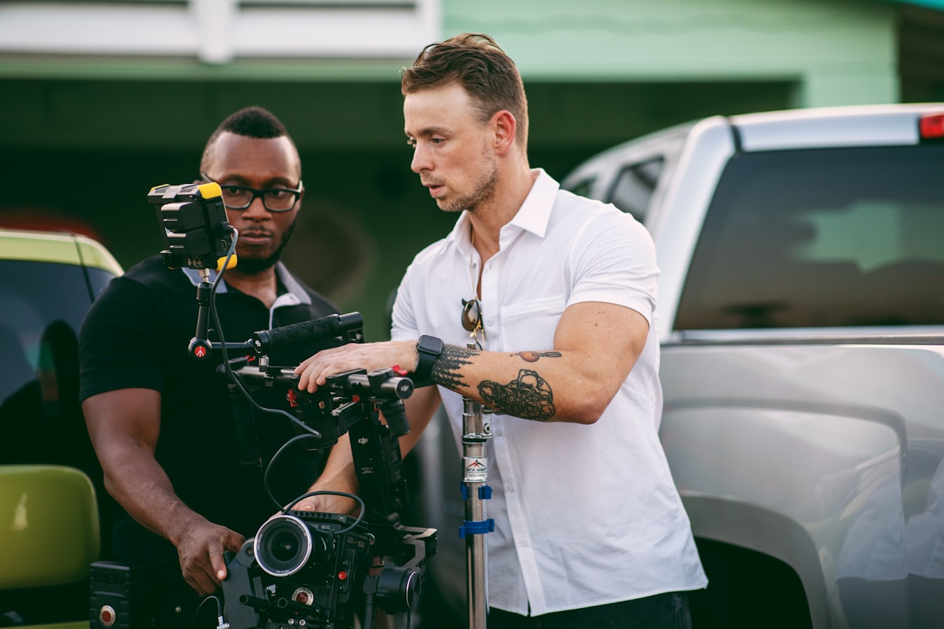 Photographer and model reviewing a printed release form together on a photography set