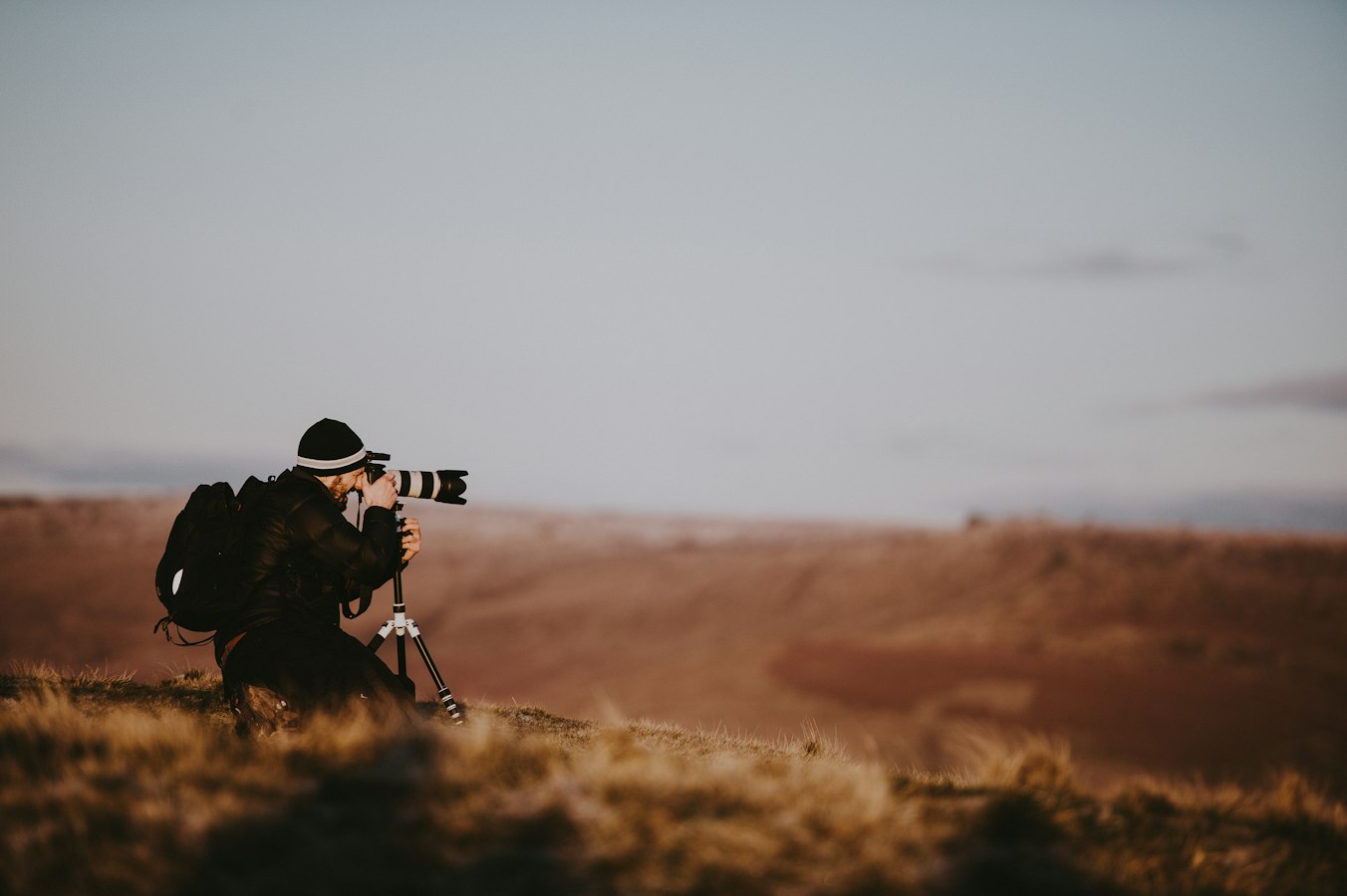 Photographer shooting a brand ambassador on location during a commercial campaign