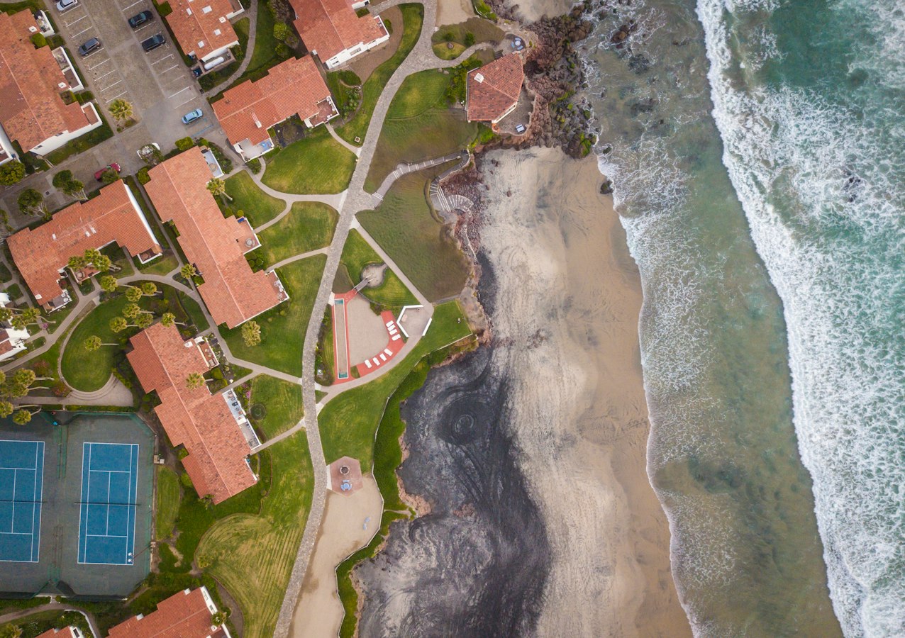 Host inspecting vacation rental property for damage after guest checkout