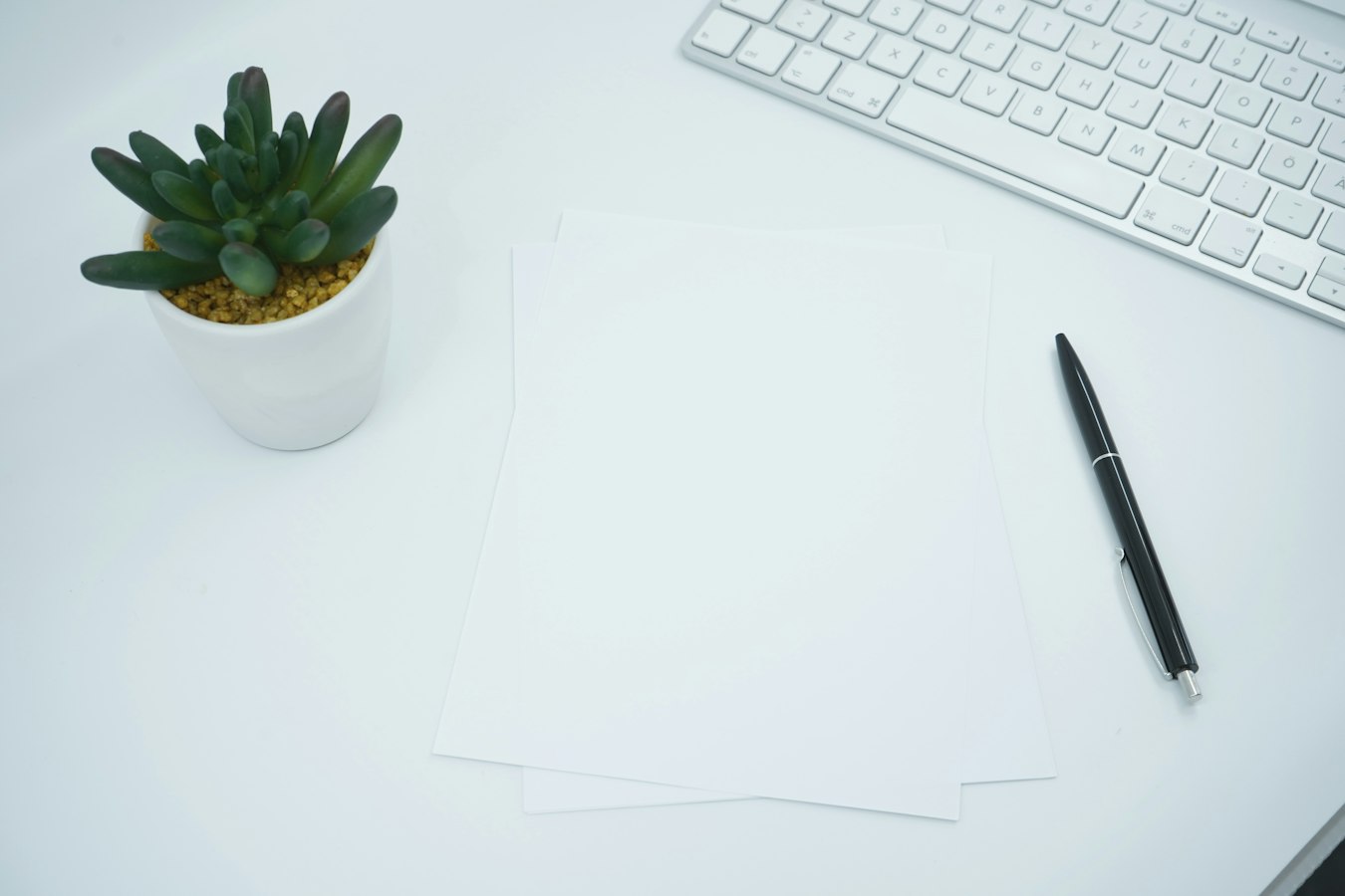 A Word document open on a laptop screen showing a clean header area above a letter body