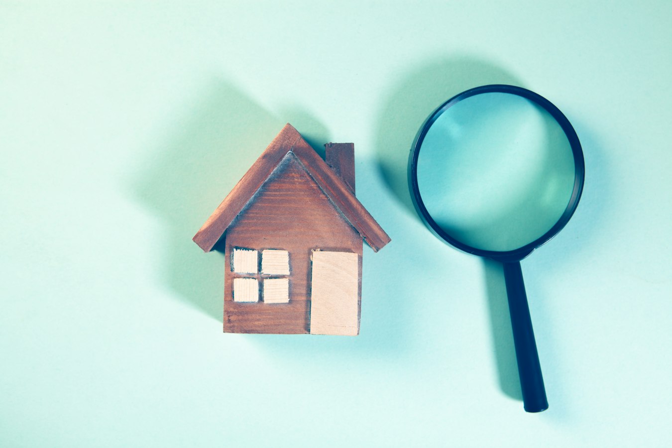 Host inspecting a vacation rental room with a checklist in hand