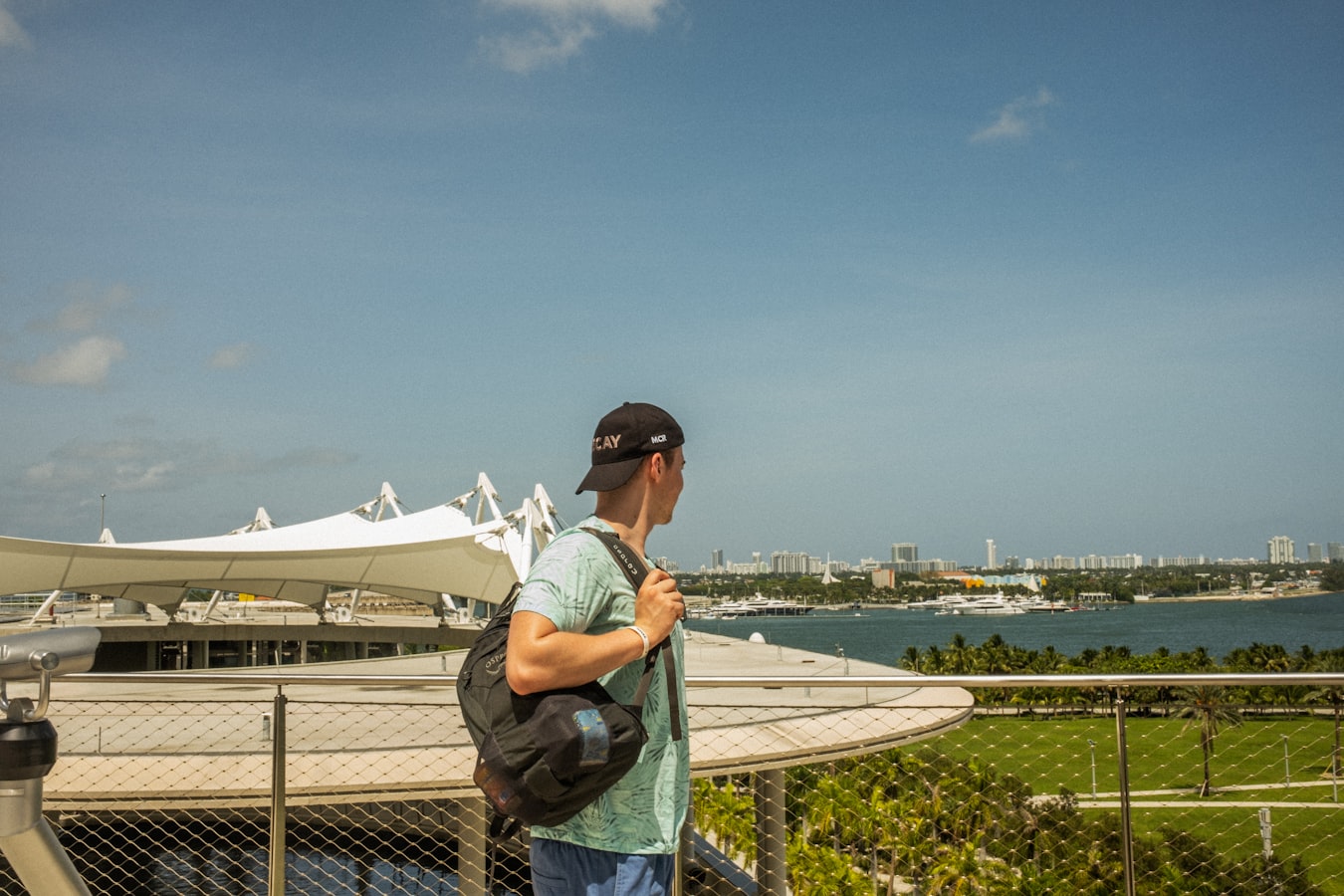 Photographer reviewing a model release form with a subject on a sunny Florida shoot
