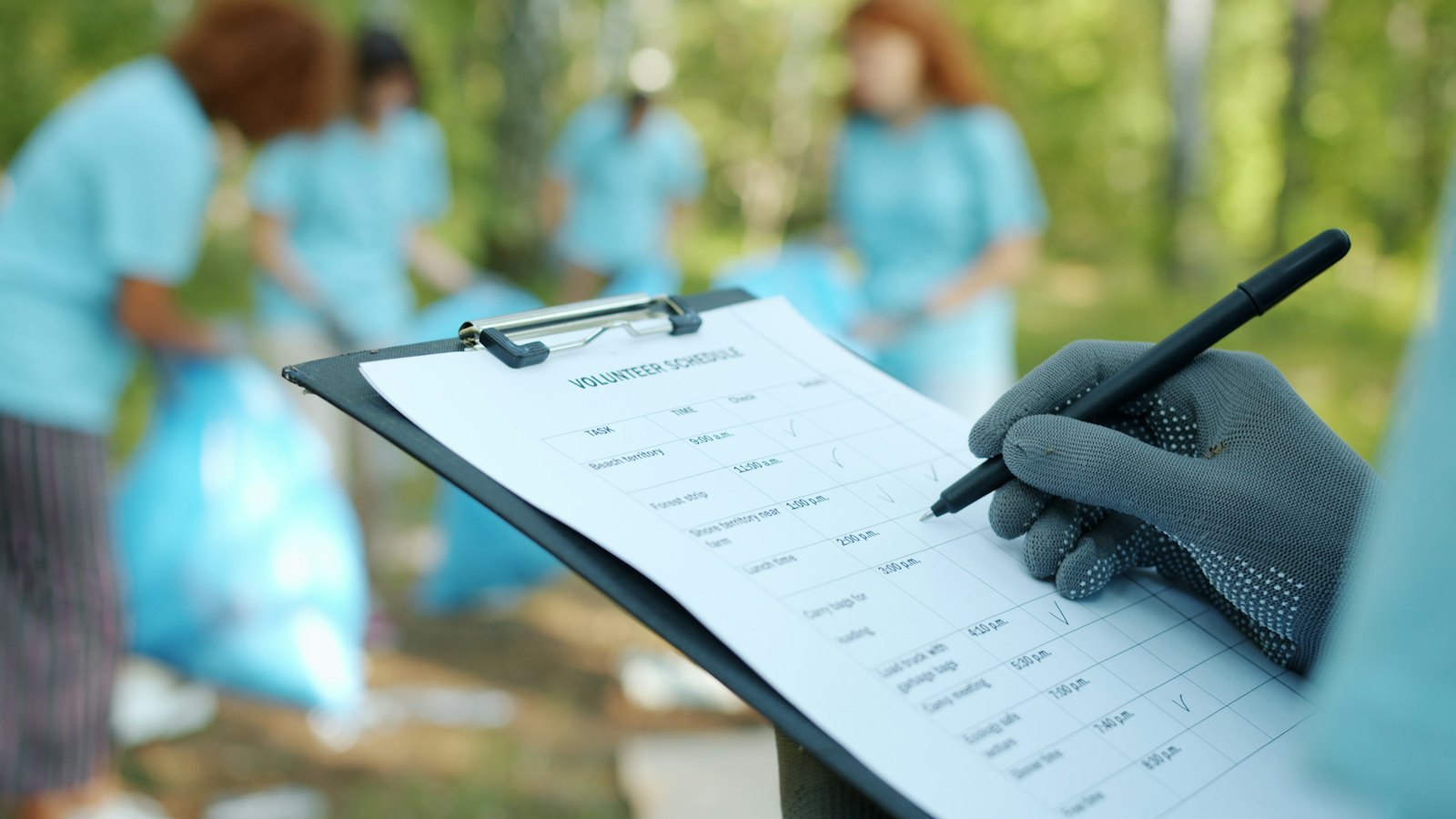 A host holding a clipboard while inspecting a vacation rental property