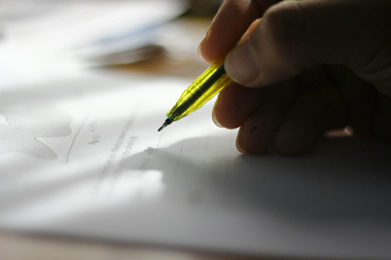 A contractor writing a repair invoice on a clipboard at a vacation rental property