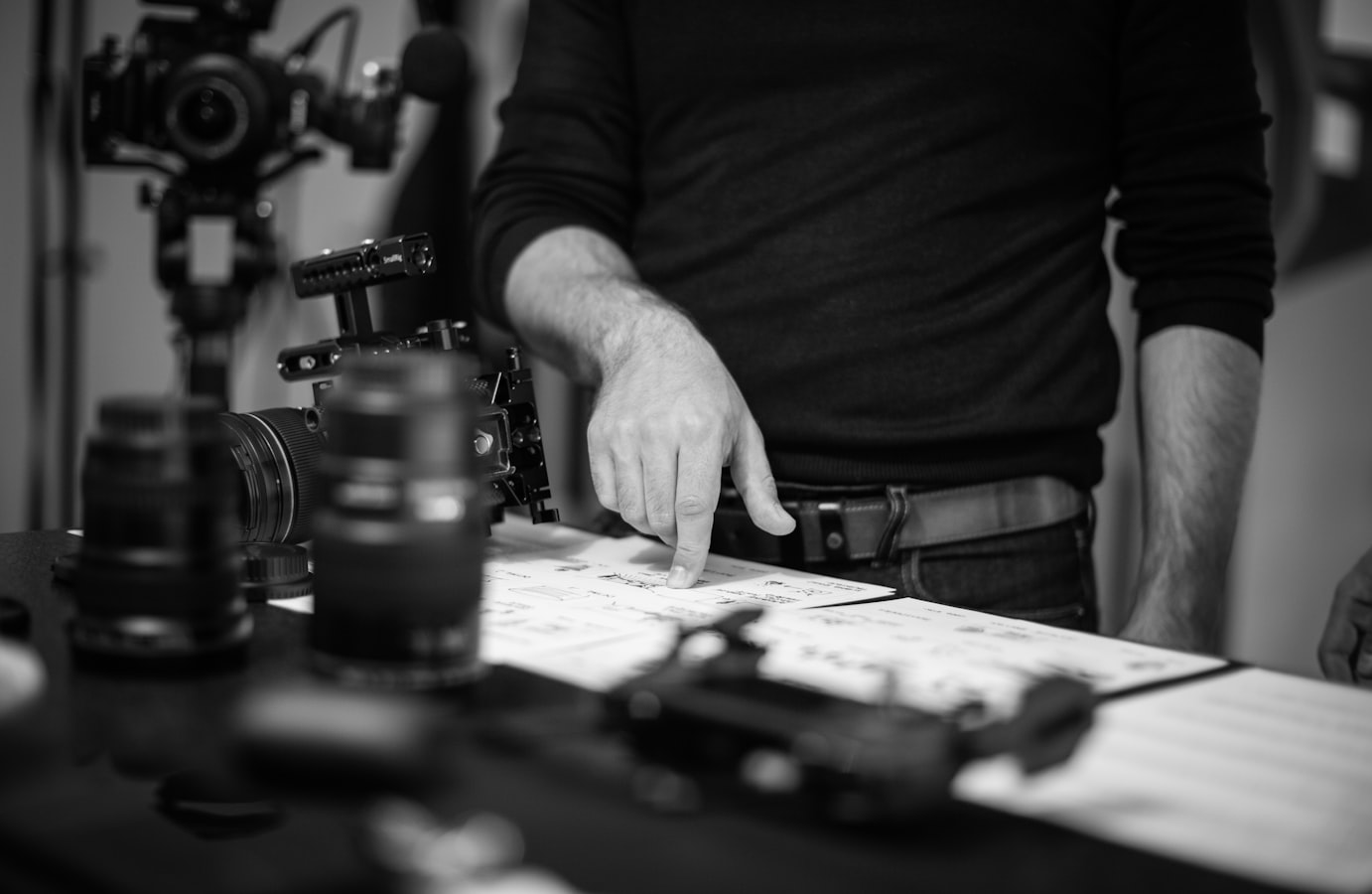 Photographer reviewing a model release form with a subject on a studio shoot set in Illinois